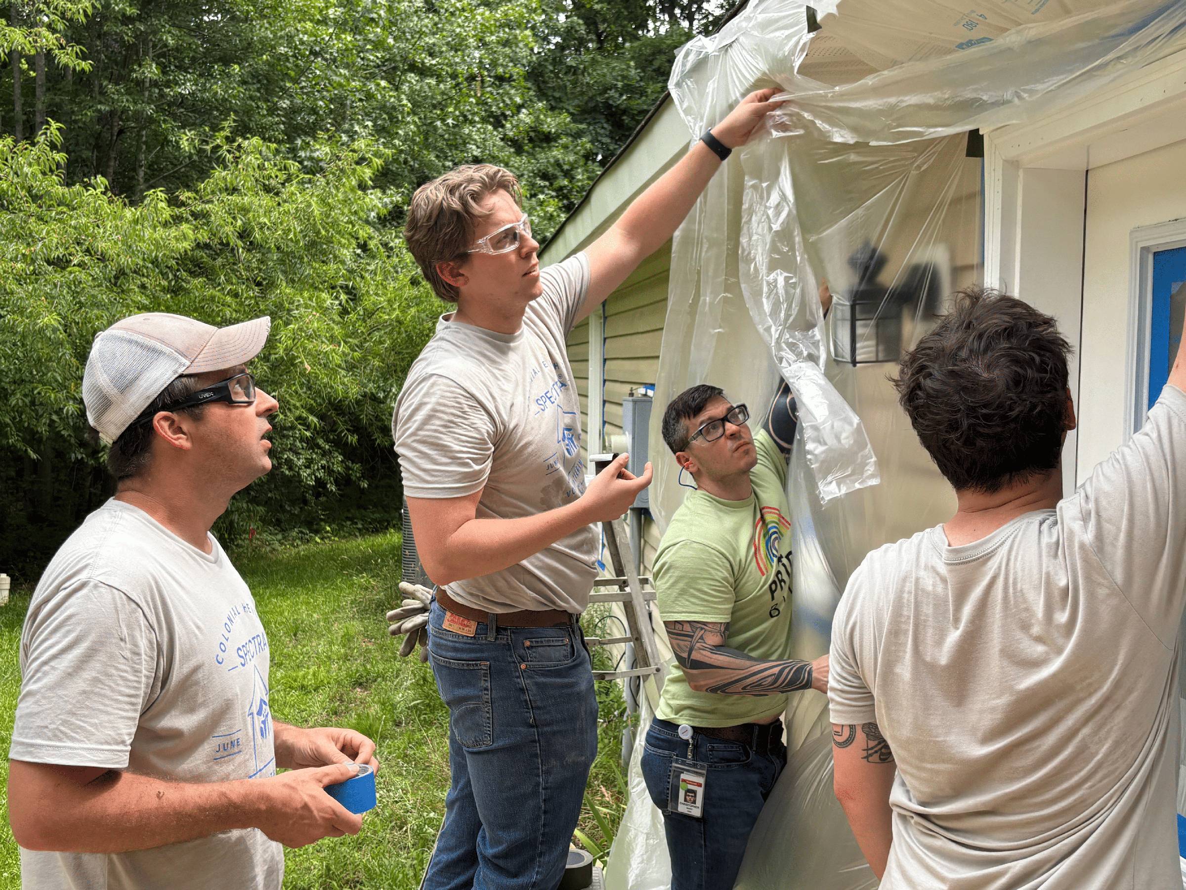 In this photo, Solstice Advanced Materials employees, based Colonial Heights, VA, volunteer with Habitat for Humanity for the day.