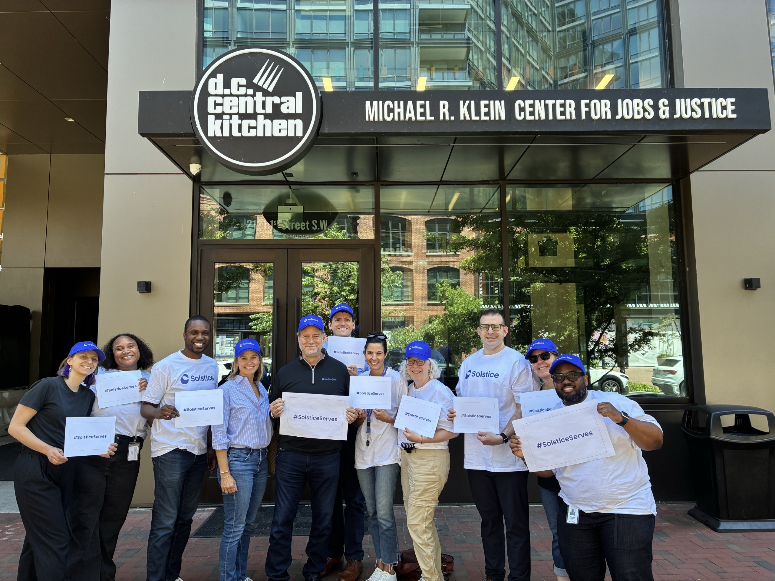 In this photo, Solstice Advanced Materials employees stand in front of the D.C. Central Kitchen before volunteering to serve food for the day.